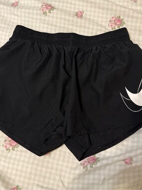 Nike Black Women's Athletic Shorts with White Swoosh Accent